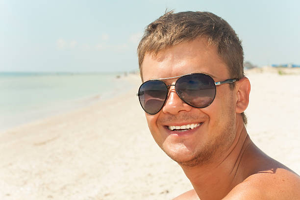 istock guy in wearing black glasses 182114903