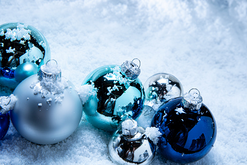 Christmas Ornaments on a Snow Background