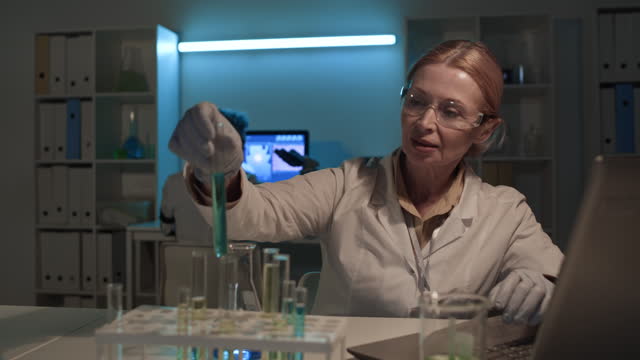 Two Diverse Female Biochemists Working in Lab