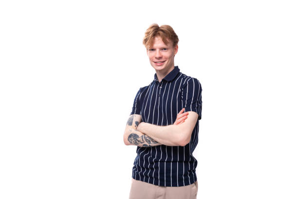 istock stylish handsome young blond man with tattoos on his arm on a white background 1821242937