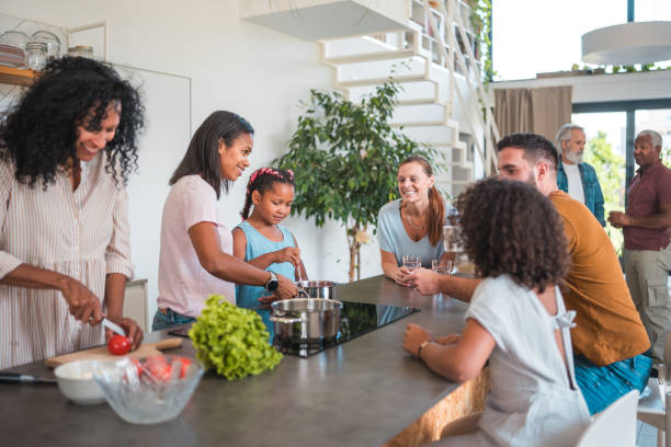 istock Multicultural Family Cooking Together in Modern Kitchen 1821266480