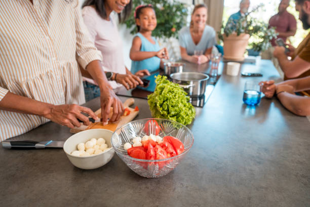 istock Woman Slicing and Preparing Veggies 1821266487
