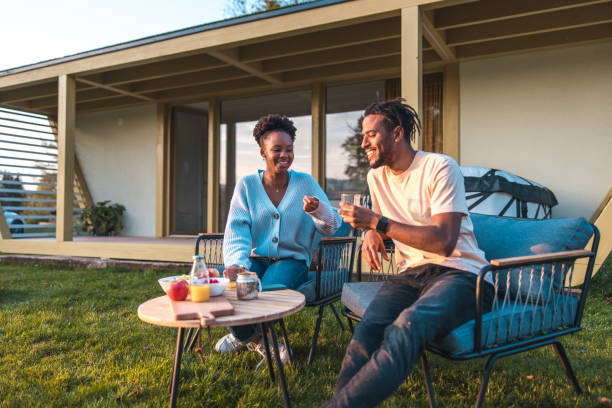 istock Happy Black Couple Enjoying a Drink Outside 1821272955