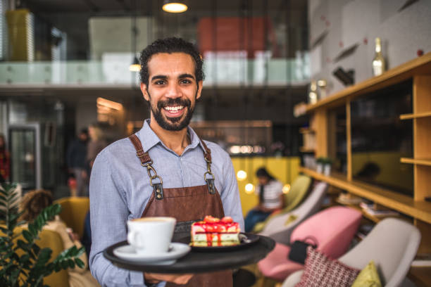 istock Middle Easter Waiter Holding A Serving Tray In A Cafe 1821276235