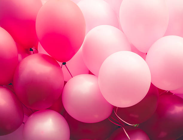 Group of balloons in various shades of pink pink ballons background gift vibrant color red pink stock pictures, royalty-free photos & images