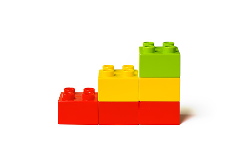 Graph, diagram, chart, bar or statistic from building block toy. kid brick step stair. Creative solution, bank, finance, investment, money concept