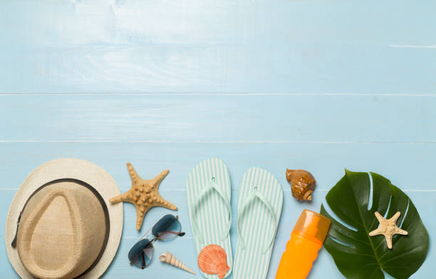 istock Beach accessories on wooden background, flat lay 1821380257