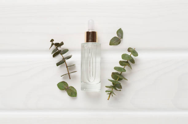 istock Herbal face serum on wooden background, top view 1821380267
