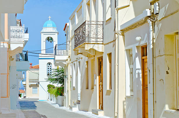 Greek architecture. One street of Chora, the biggest town in Andros' island, Greece. andros island stock pictures, royalty-free photos & images