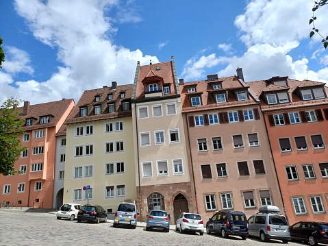 Nuremberg, Germany - June 10, 2023: Cars in parking lot and houses in Nuremberg city, Germany.