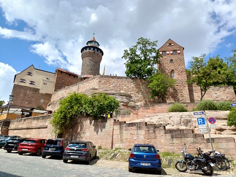 La Rochepot, France - July 1, 2020: Castle of La Rochepot in Burgundy, France. Castle of La Rochepot is a 12th-century feudal castle of neo-Gothic-Burgundian style