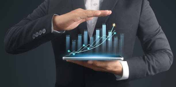 istock Businessman plan graph growth and increase of chart positive indicators,tablet in hand 1821420445