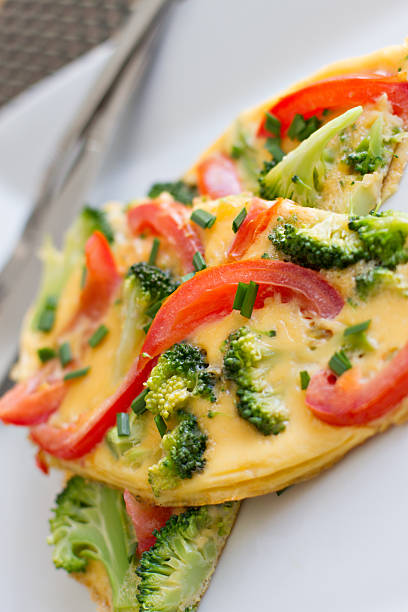 Broccoli and Tomato Omelette (omelet) stock photo