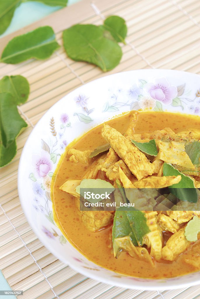 pork curry close up homemade pork and bamboo shoot curry with kaffir lime leaf decorated Asian Culture Stock Photo