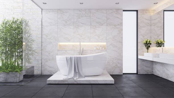 istock modern luxury bathroom design,white room,white bathtub on  marble wall ,3d render 1821430165