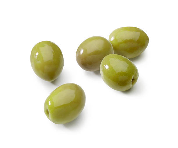 Olives isolated "Olives isolated. The file includes a excellent clipping path, so it's easy to work with these professionally retouched high quality image. Thank you for checking it out!" green olive fruit stock pictures, royalty-free photos & images