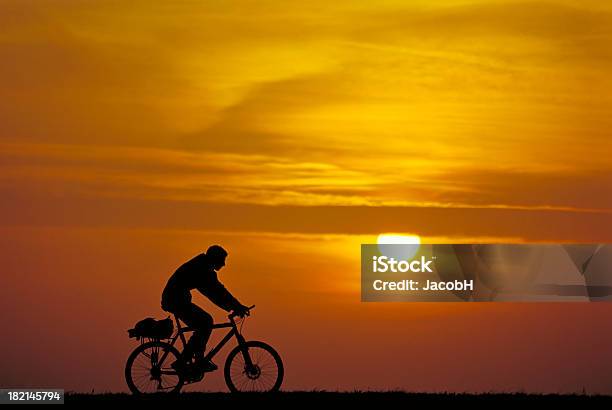 Biker At Sunrise Stock Photo - Download Image Now - Adult, Back Lit, Beauty