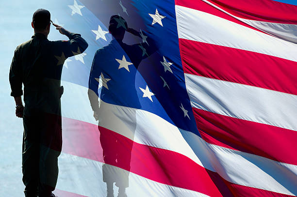 American Heroes II "Flag and soldiers saluting. Very symbolic. Red, White and Blue." national guard stock pictures, royalty-free photos & images