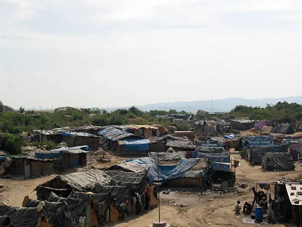 "Slum Dwellers in India, these are migrant workers who work on construction projects."