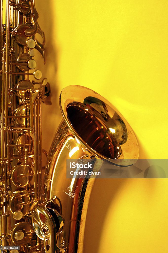 Alto Sax on Yellow Closeup of an alto saxophone. Arts Culture and Entertainment Stock Photo