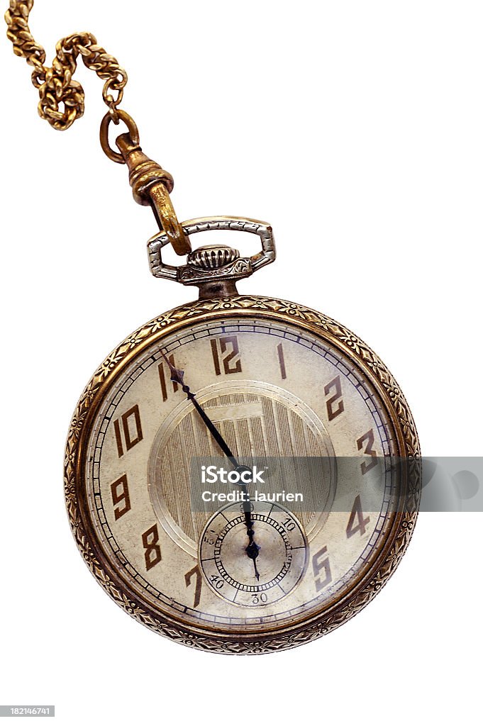 Vintage gold Art Deco pocket watch Antique early 20th century gold, open-faced, Waltham pocket watch. The gold and white enamel watch face reads 5:55 with an additional seconds dial at 30 seconds. The outer gold base has intricate gold detailing and a top winding stem with a fob chain attached. This beautiful vintage timepiece is isolated on a white background. Old Stock Photo