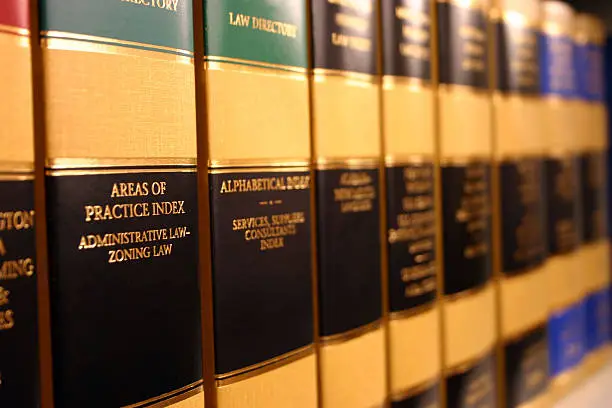 Books on a shelf of a legal library