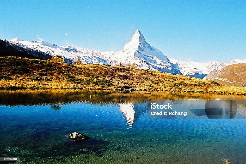 Matterhorn in Lake A beautiful reflection of Mt. Matterhorn from lake. Autumn Stock Photo