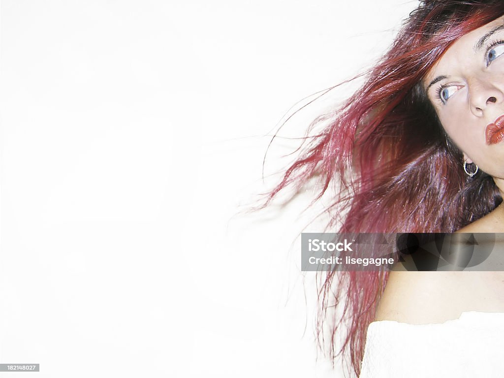 Cropped shot of a woman looking away Dramatic and high contrast shot of a beautiful woman looking off camera. Cut Out Stock Photo