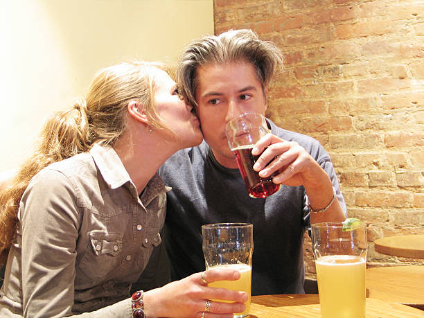 istock Young couple in a bar 182148102