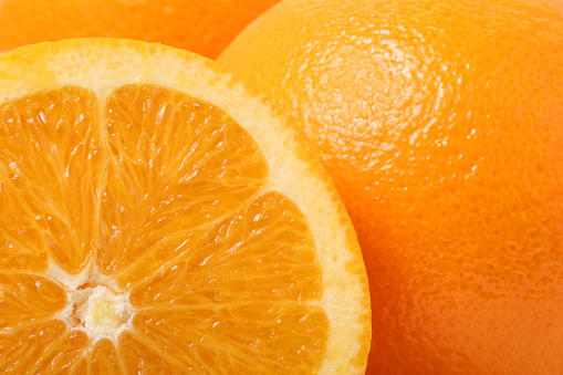 Sliced orange citrus fruit isolated on white background. Orange slices with clipping mask (alpha channel) for quick isolation. Full depth of field.