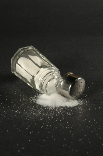 Salt spilling from the salt shaker can have many meanings.  What meaning could it have for you