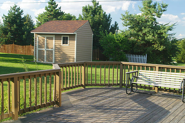 Back Yard Deck Swing & Barn stock photo