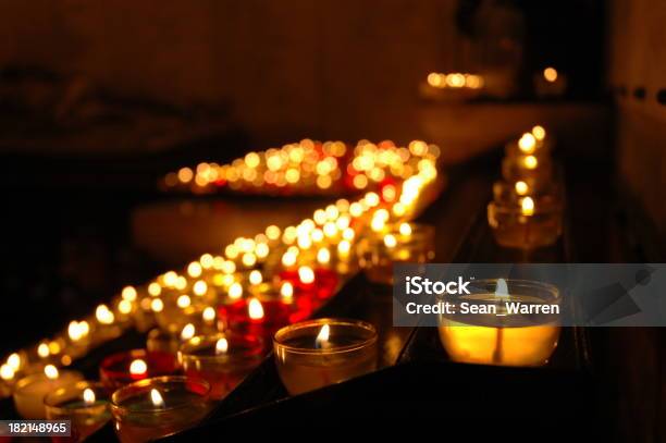 Catholic Prayers To The Saints Stock Photo - Download Image Now - Religious Mass, Catholicism, Candle