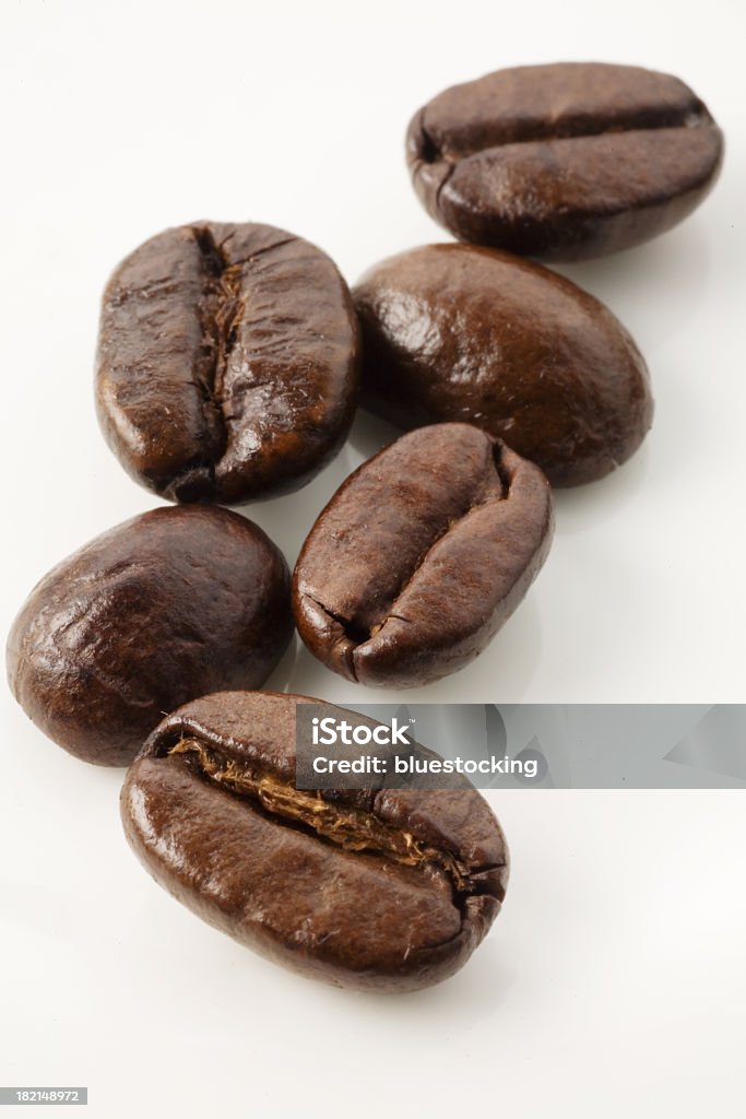Close up of coffee beans on white background Close-up of coffee beans. Caffeine Stock Photo