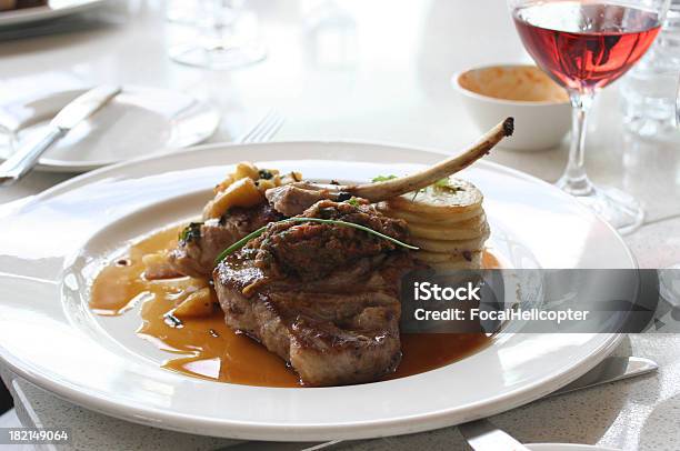 Grilled Gourmet Pork Dinner Stock Photo - Download Image Now - Bright, Brightly Lit, Chive