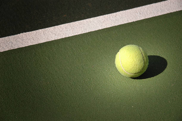 istock iluminated tennis ball 06 182149139