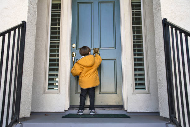 Knock Knocks A Child knocking on a doorMore Children Model Images knocking on door stock pictures, royalty-free photos & images