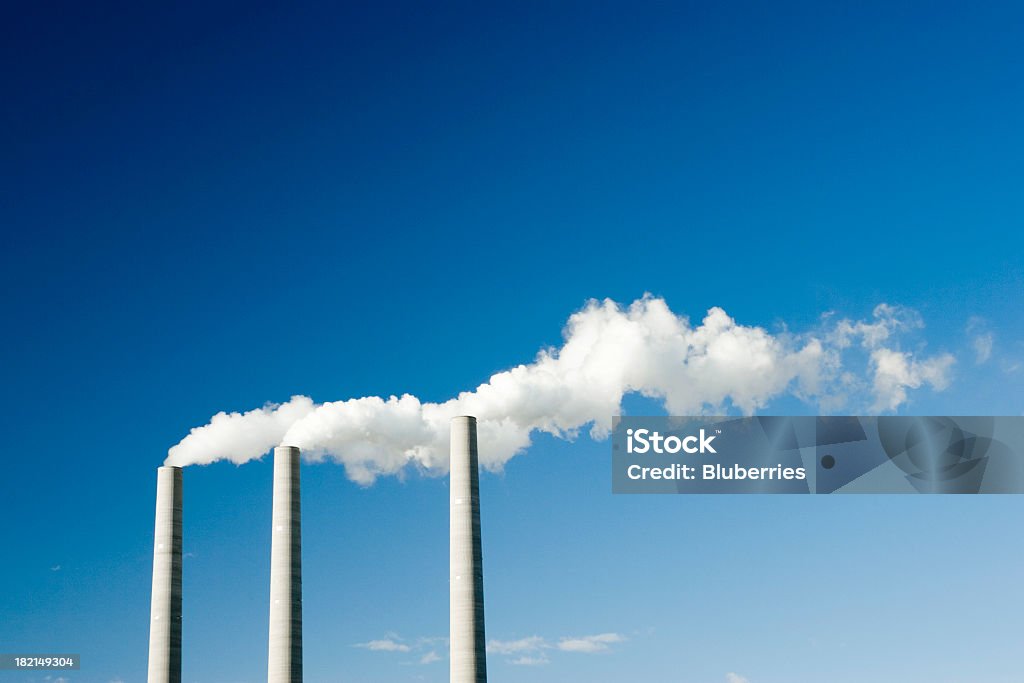 Cloudmaker smoke stacks on blue sky Smoke Stack Stock Photo