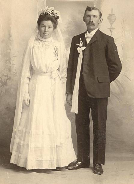 German Wedding A 1902 wedding photo of a lovely couple from Germany. 19th century photos stock pictures, royalty-free photos & images