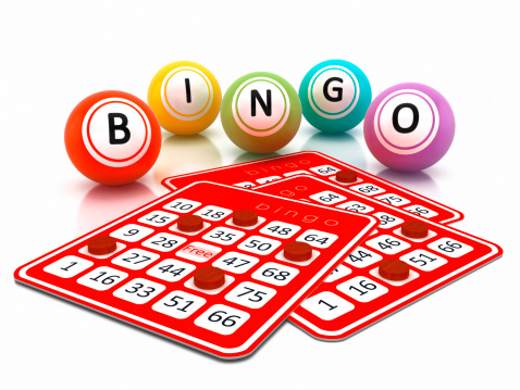 Bingo cards and balls on white reflective surface.Bingo cards and balls on white reflective surface.Similar images: