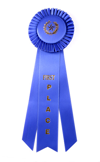 Blue ribbon for the first place winner. Includes path. Isolated.