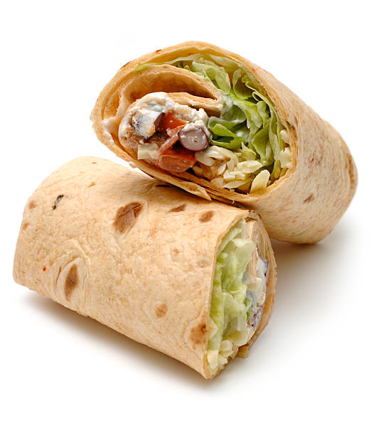 chilli tortilla sweet potato, tomato salsa & cheese wrap isolated against white