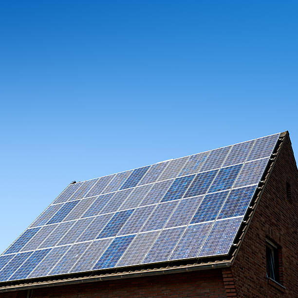 istock Solar panels against a blue sky with many copyspace 182150547
