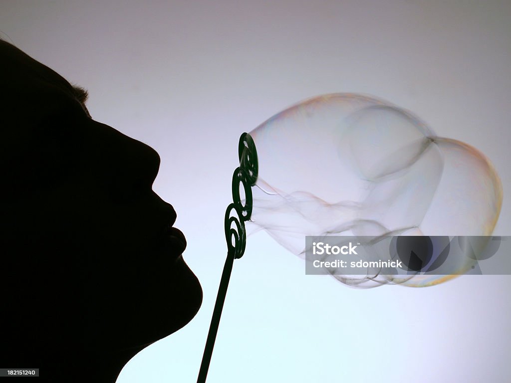 Silhouette - Bubbles  Blowing Stock Photo
