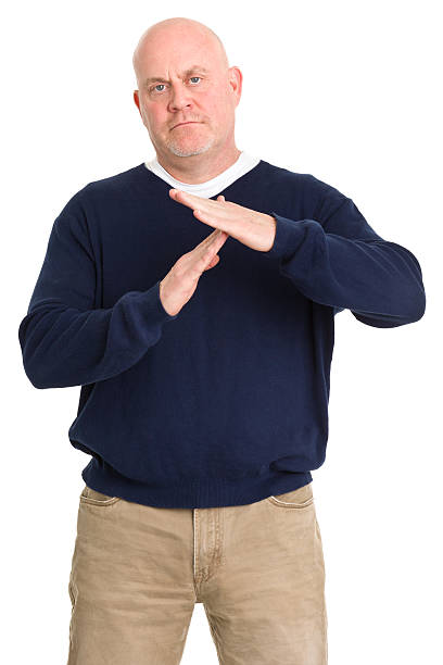 istock Mature Man Gives Time Out Signal 182151517