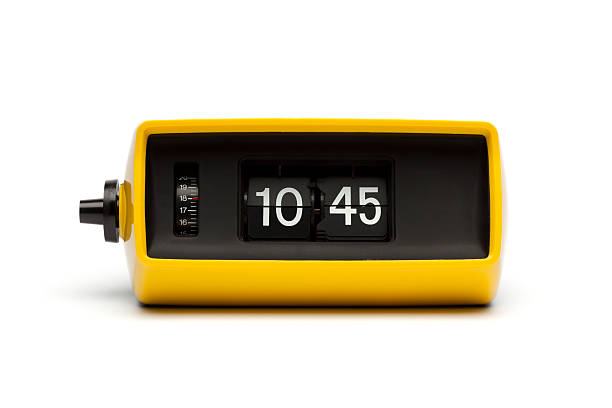 retro-digitale flip clock - isolated on yellow stock-fotos und bilder