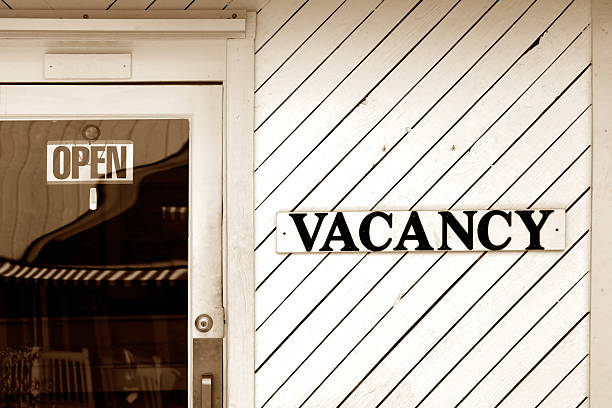 istock vacancy sign on motel wall 182152427