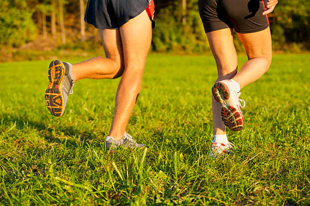 istock Athletes running on the meadow 182152890