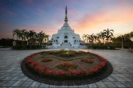 Beautiful White Pagoda at Wat Sangtham in sunset time at Wang Nam Khiao District, Nakhon Ratchasima Thailand.