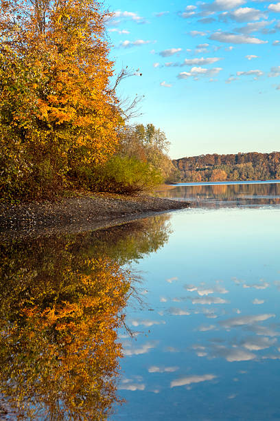 istock Autumn Reflection of Trees and Clouds 182153219